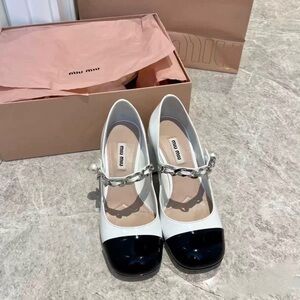 Miu Miu White Leather Mary Jane Pumps with Black Cap Toe and Pearl Chain